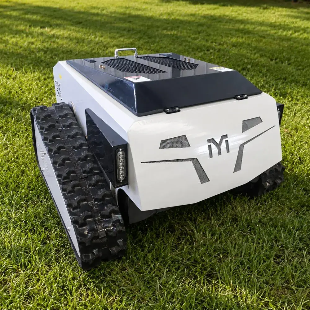 white tracked remote mower for orchard grass management