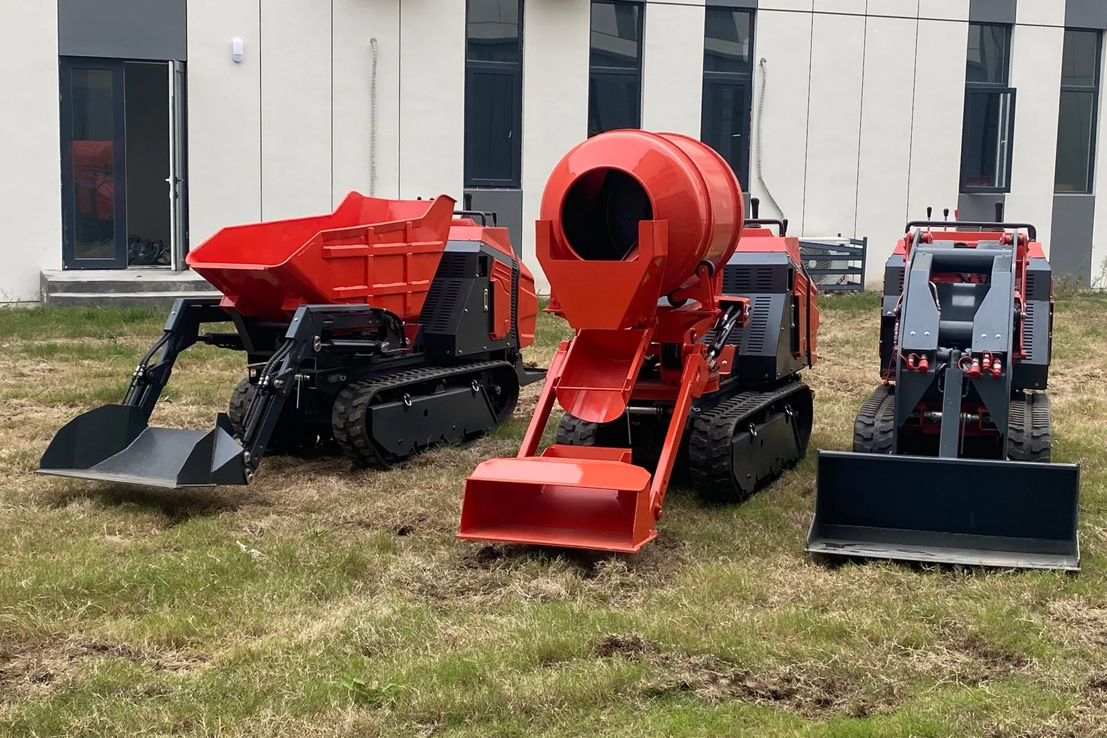 C1200 utility tracked machine with mixer and dump configurations