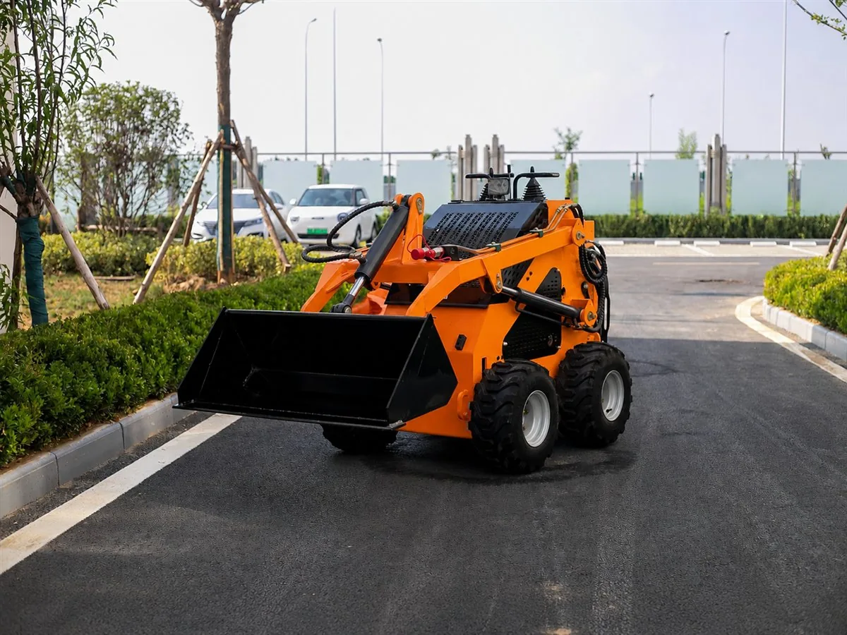 Orange customized KORVA S360 mini skid steer loader with bucket