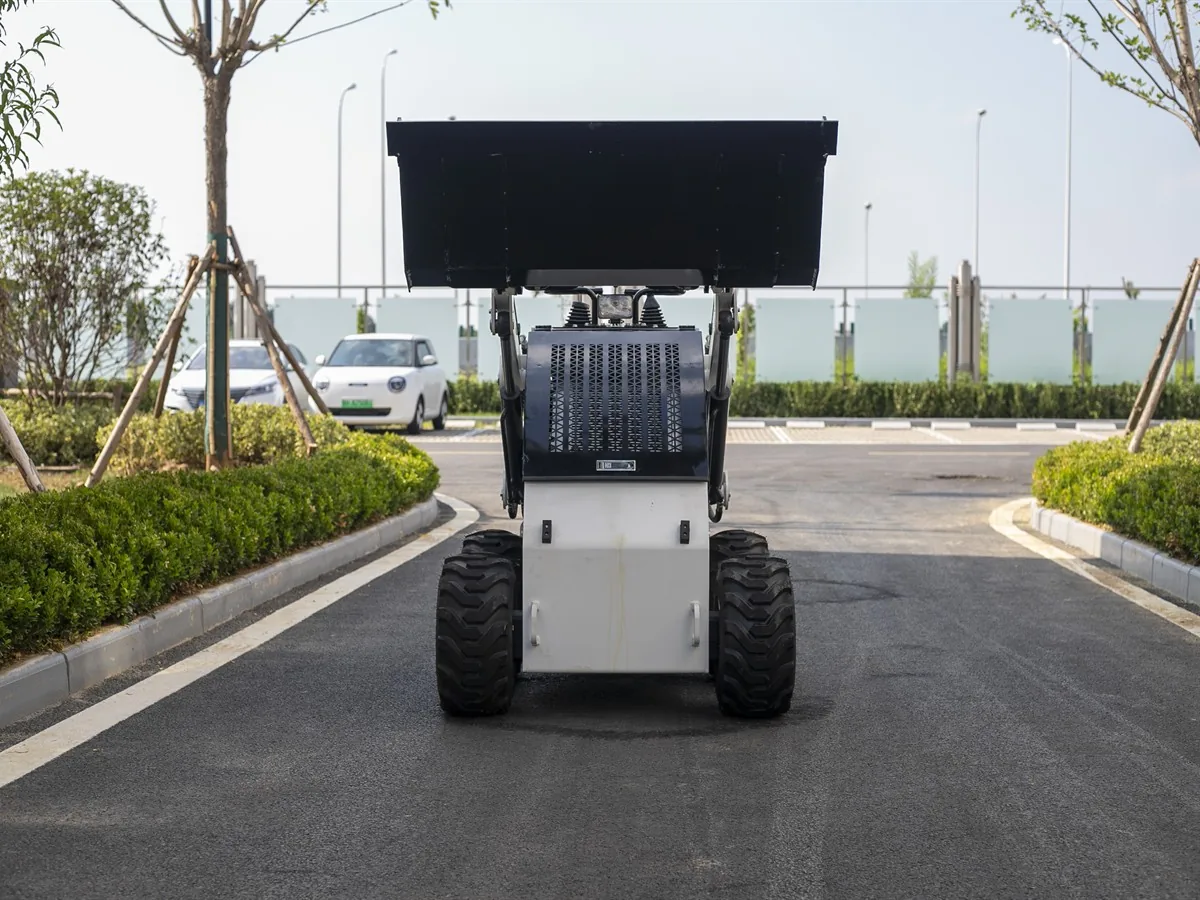 KORVA S360 mini skid steer loader front view with bucket raised