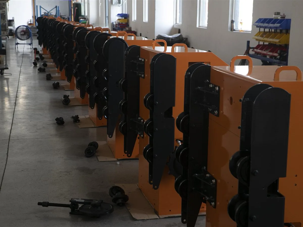 Compact loaders arranged on a mini skid steer production line