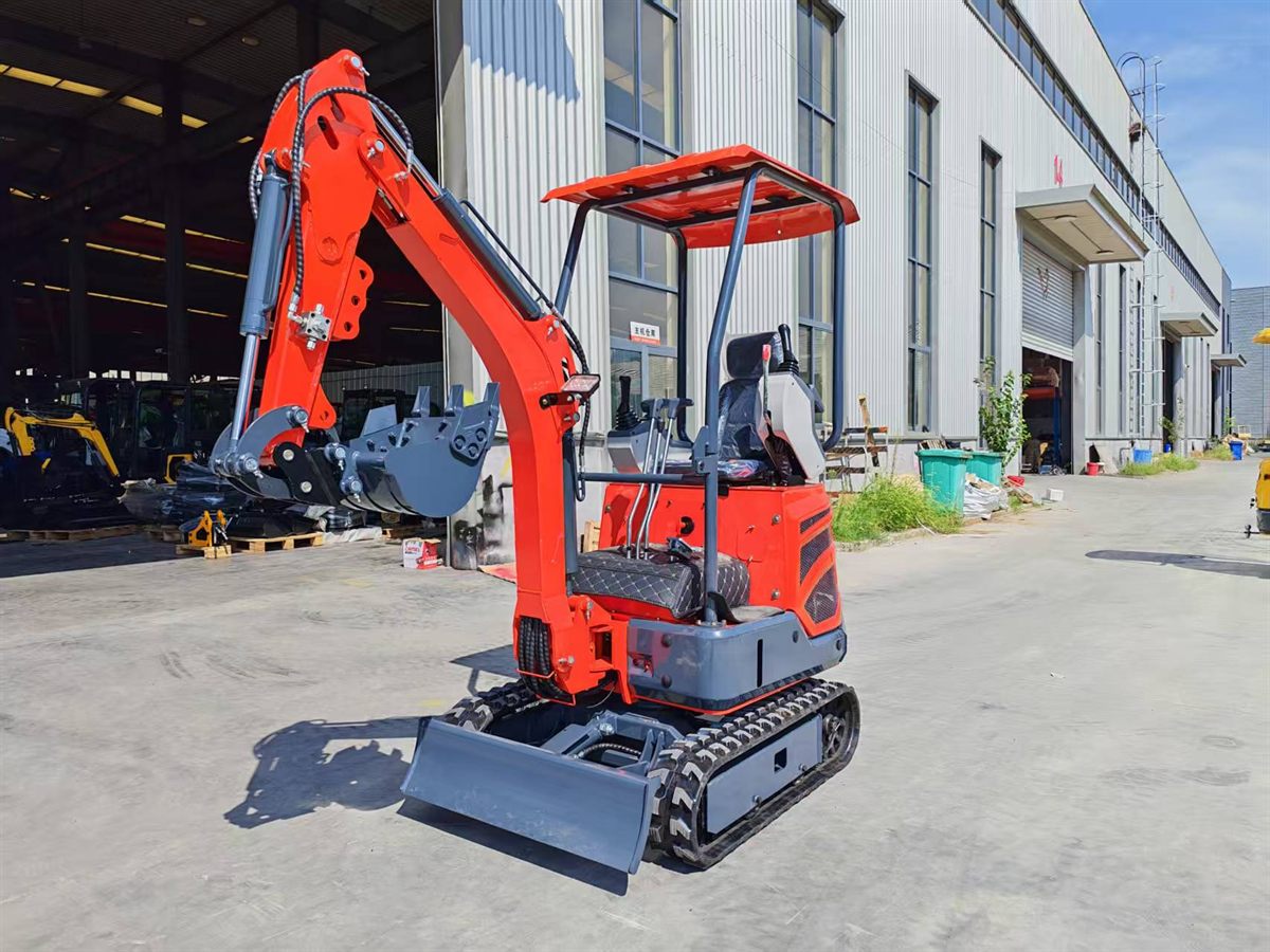 Compact crawler mini excavator with dozer blade and digging bucket