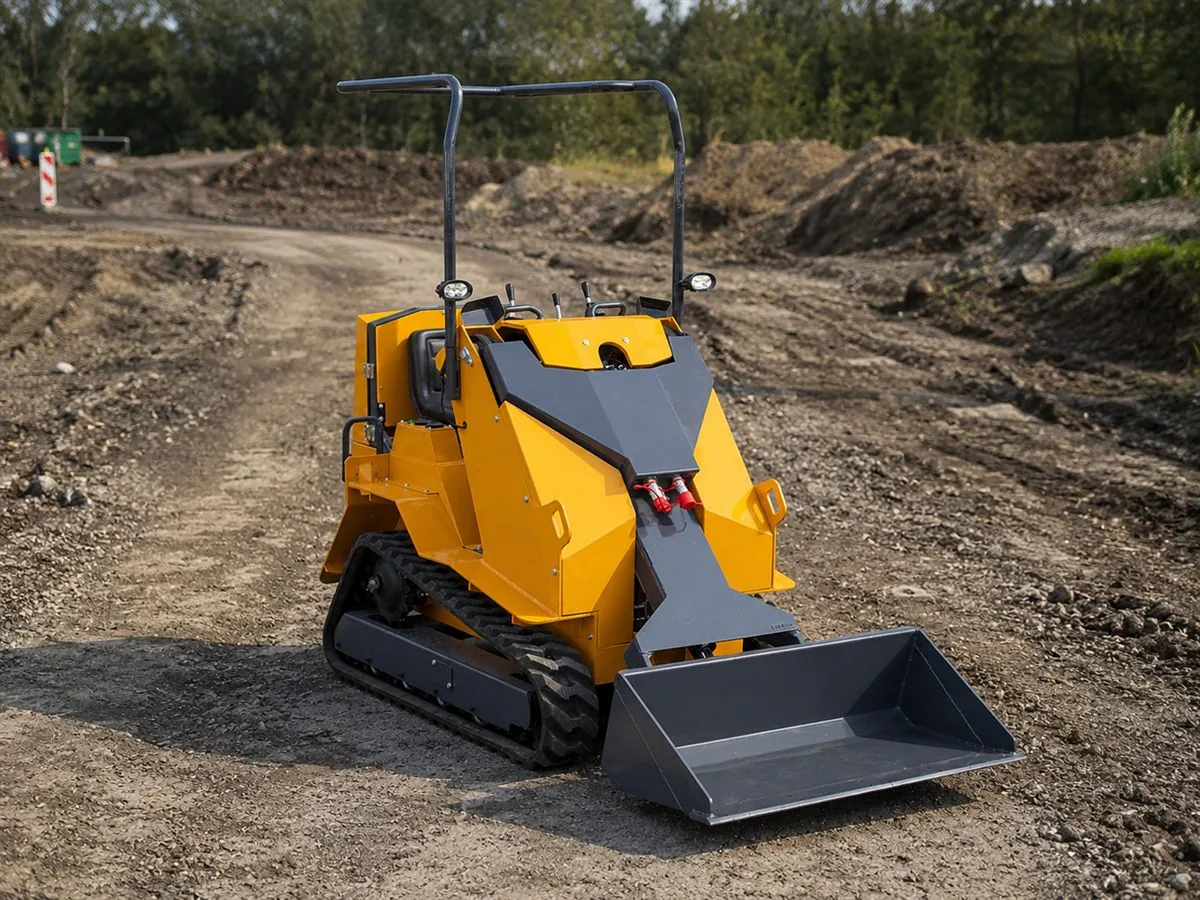 KORVA T390 ride-on mini skid steer loader front view with bucket