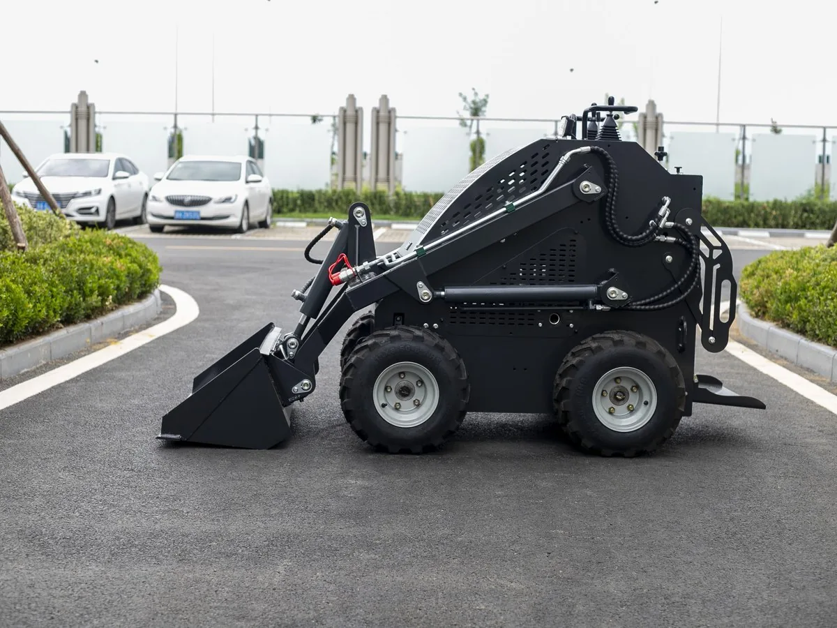 KORVA S460 wheel mini skid steer loader comparison view on firm ground