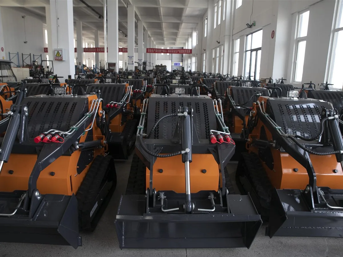 Finished compact mini skid steer loaders staged in the workshop