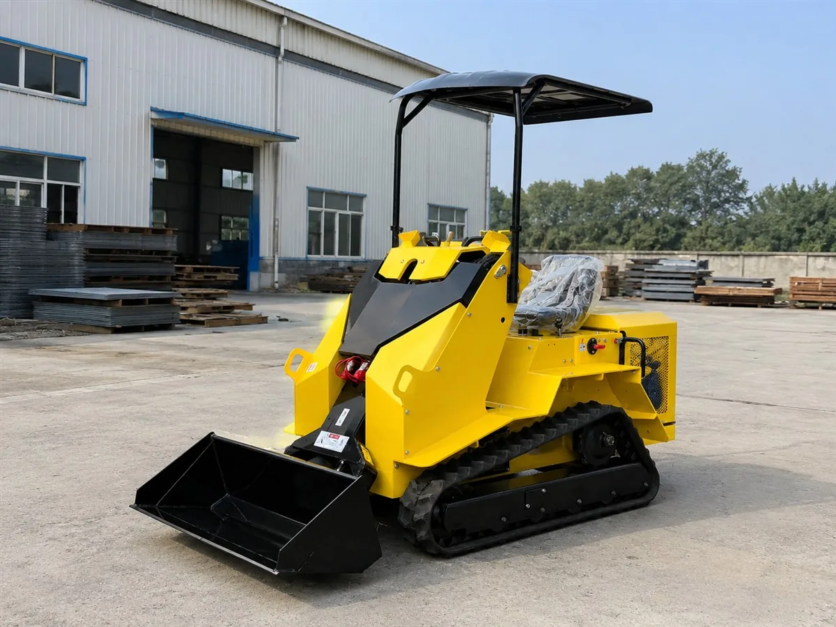 Yellow customized KORVA T490 ride-on tracked mini skid steer loader for rental business